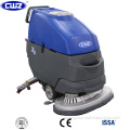 Dual brush automatic concrete floor cleaning machine